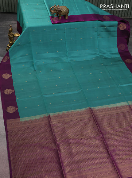 Kanchipuram soft silk saree teal green shade and purple with zari woven buttas and zari woven butta border