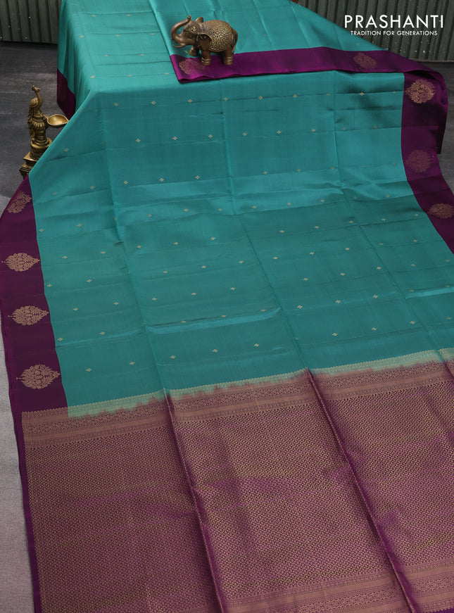 Kanchipuram soft silk saree teal green shade and purple with zari woven buttas and zari woven butta border