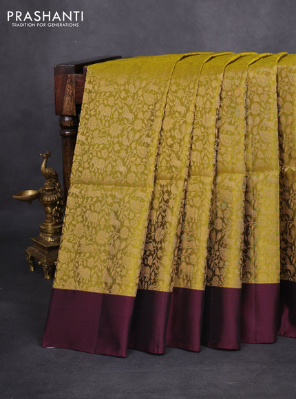 Kanchipuram soft silk saree mehendi green and wine shade with allover zari woven brocdae weaves and simple border