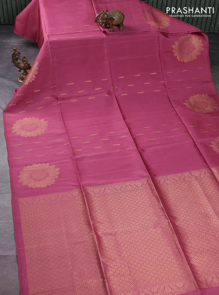 Kanchipuram soft silk saree dark peach with allover zari woven buttas and zari woven floral butta border