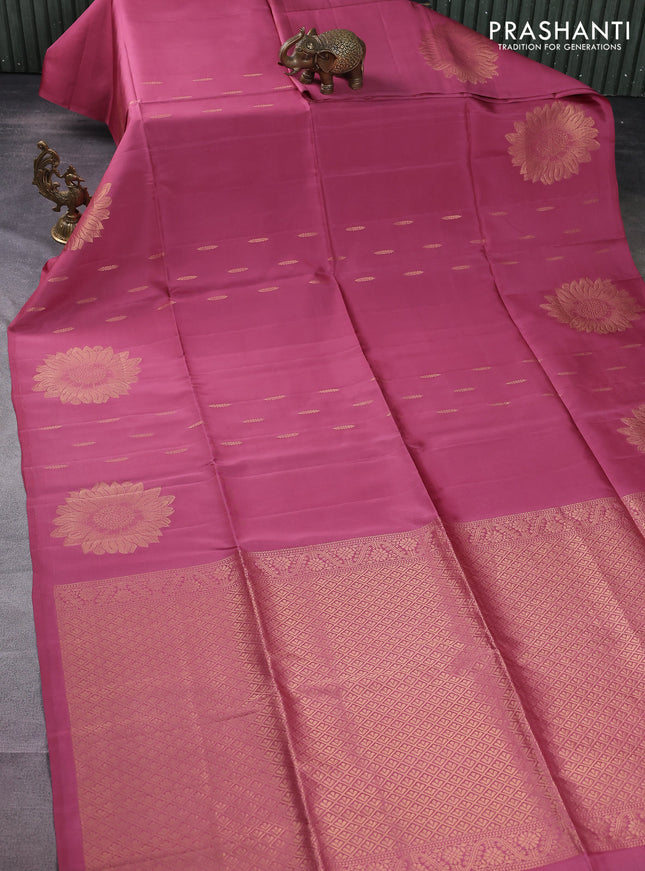 Kanchipuram soft silk saree dark peach with allover zari woven buttas and zari woven floral butta border