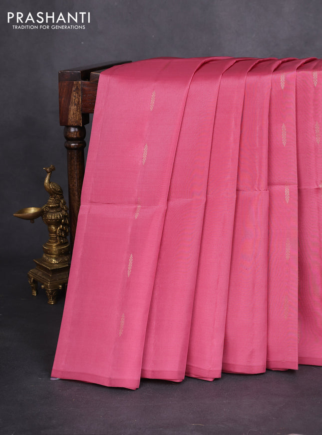 Kanchipuram soft silk saree dark peach with allover zari woven buttas and zari woven floral butta border