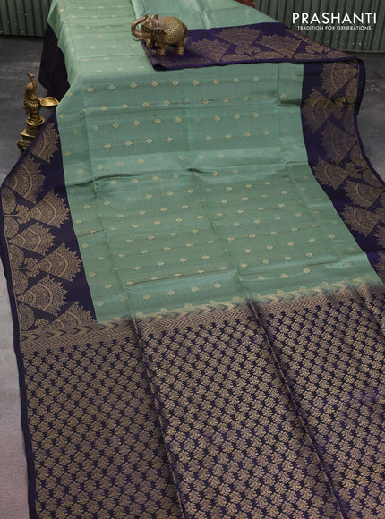 Kanchipuram soft silk saree pastel green and navy blue with allover zari woven brocade weaves and long zari woven border