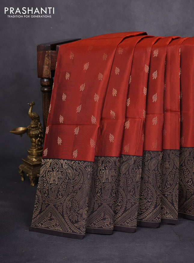 Kanchipuram soft silk saree rust shade and deep coffee brown with allover zari woven buttas and long zari woven border