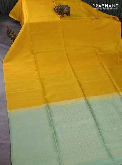 Kanchipuram soft silk saree yellow and pastel green with allover zari weaves in borderless style