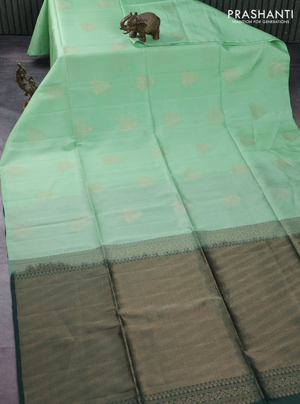 Kanchipuram soft silk saree teal green shade and bottle green with allover zari weaves in borderless style