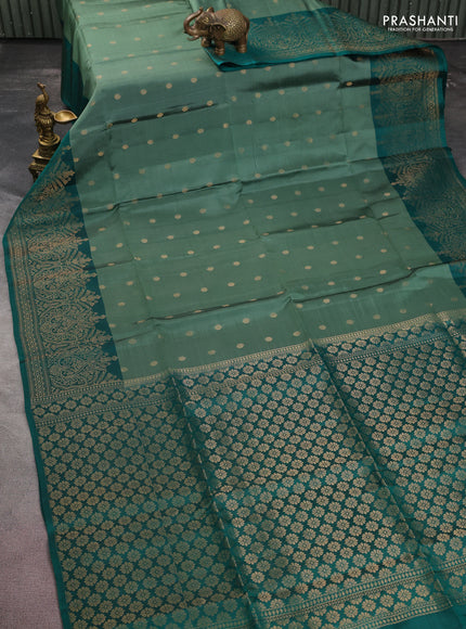 Kanchipuram soft silk saree pastel green shade and teal green with zari woven buttas and long zari woven border