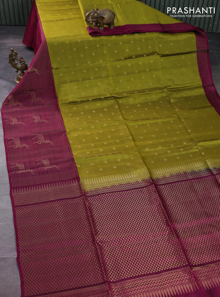 Kanchipuram soft silk saree mehendi green with allover zari woven floral buttas and long zari woven border