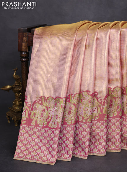 Pure kanchipuram tissue silk saree dual shade of pastel pink and wine shade with allover zari weaves and rich elephant design mina border