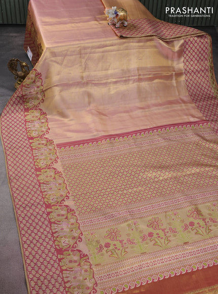 Pure kanchipuram tissue silk saree dual shade of pastel pink and wine shade with allover zari weaves and rich elephant design mina border