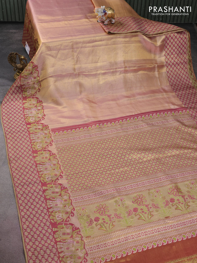 Pure kanchipuram tissue silk saree dual shade of pastel pink and wine shade with allover zari weaves and rich elephant design mina border
