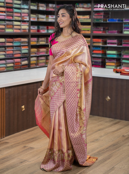 Pure kanchipuram tissue silk saree dual shade of pastel pink and wine shade with allover zari weaves and rich elephant design mina border