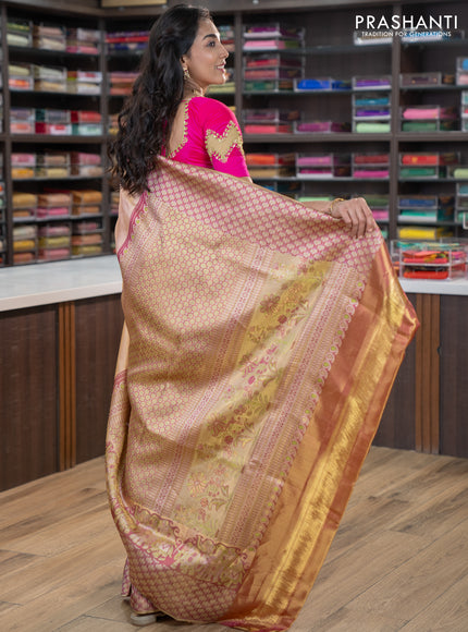 Pure kanchipuram tissue silk saree dual shade of pastel pink and wine shade with allover zari weaves and rich elephant design mina border