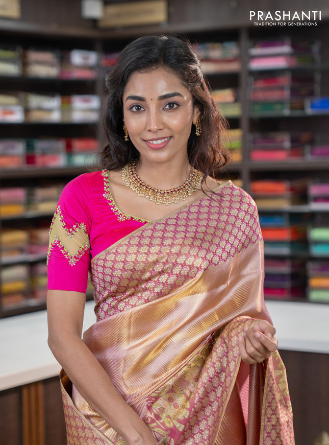 Pure kanchipuram tissue silk saree dual shade of pastel pink and wine shade with allover zari weaves and rich elephant design mina border