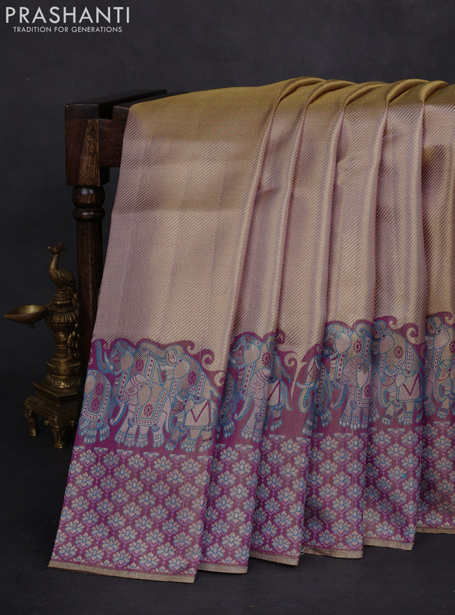 Pure kanchipuram tissue silk saree dual shade of pastel lavender and deep purple with allover zari weaves and rich elephant design mina border
