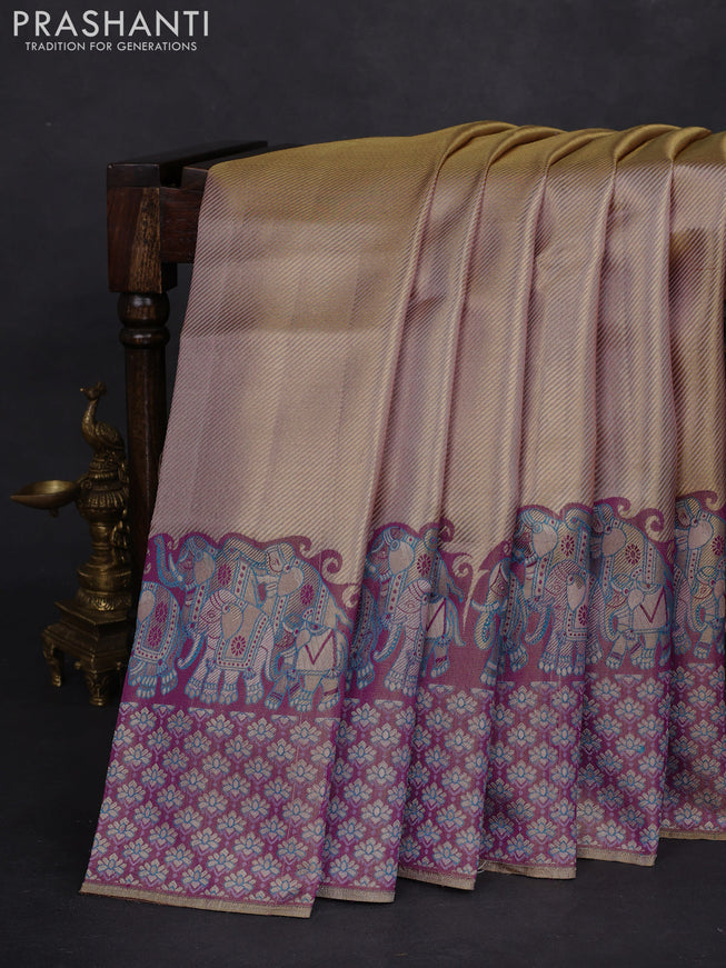 Pure kanchipuram tissue silk saree dual shade of pastel lavender and deep purple with allover zari weaves and rich elephant design mina border