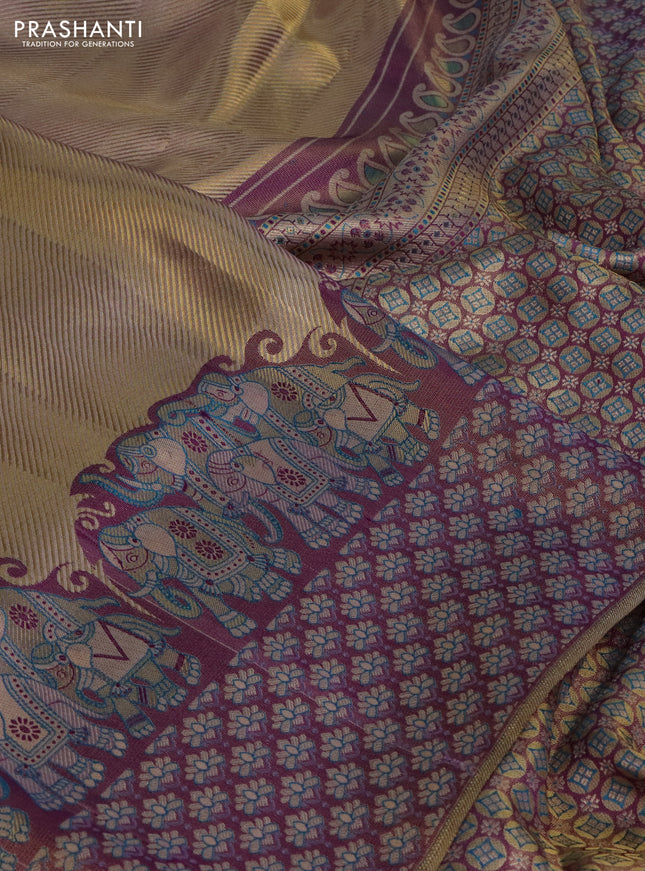 Pure kanchipuram tissue silk saree dual shade of pastel lavender and deep purple with allover zari weaves and rich elephant design mina border