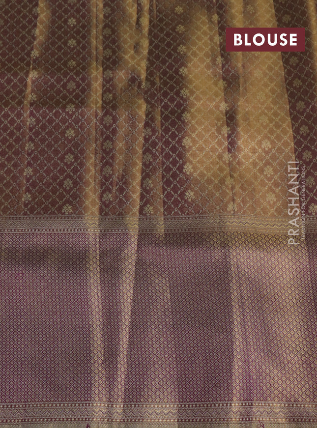 Pure kanchipuram tissue silk saree dual shade of pastel lavender and deep purple with allover zari weaves and rich elephant design mina border