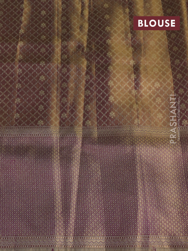 Pure kanchipuram tissue silk saree dual shade of pastel lavender and deep purple with allover zari weaves and rich elephant design mina border