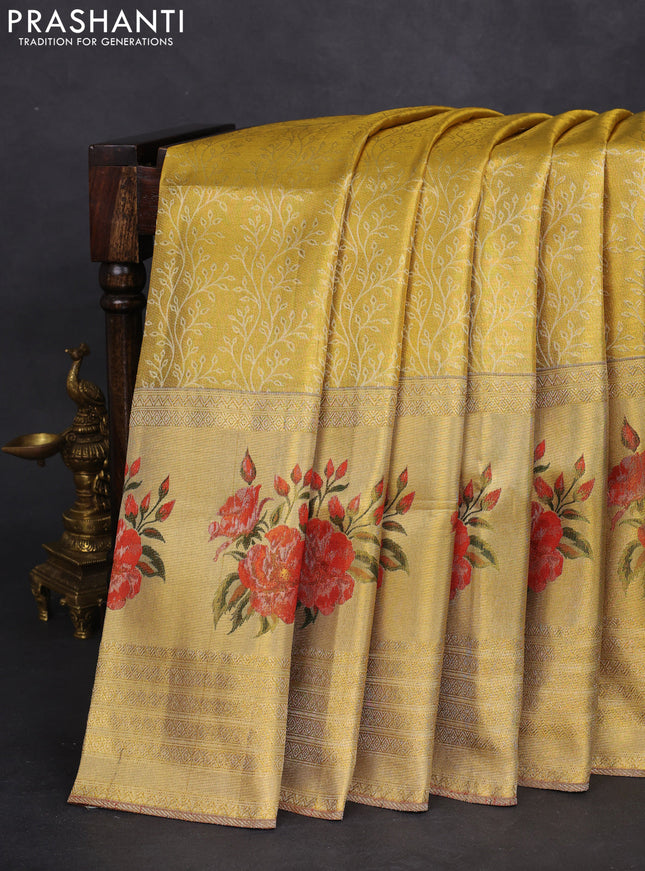 Pure kanchipuram tissue silk saree gold and red with allover zari weaves and floral design butta border