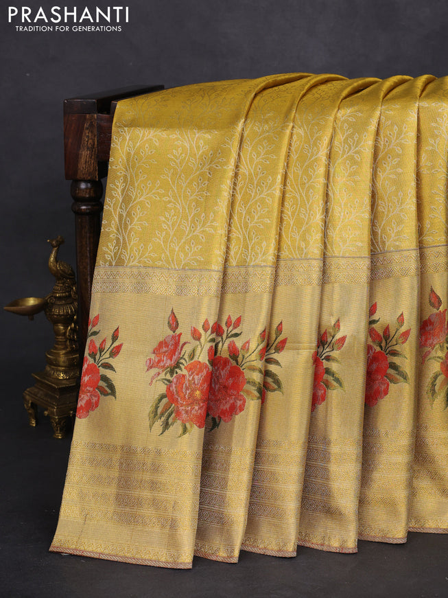 Pure kanchipuram tissue silk saree gold and red with allover zari weaves and floral design butta border