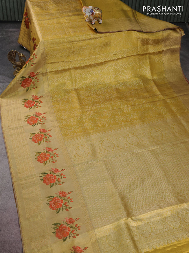 Pure kanchipuram tissue silk saree gold and red with allover zari weaves and floral design butta border