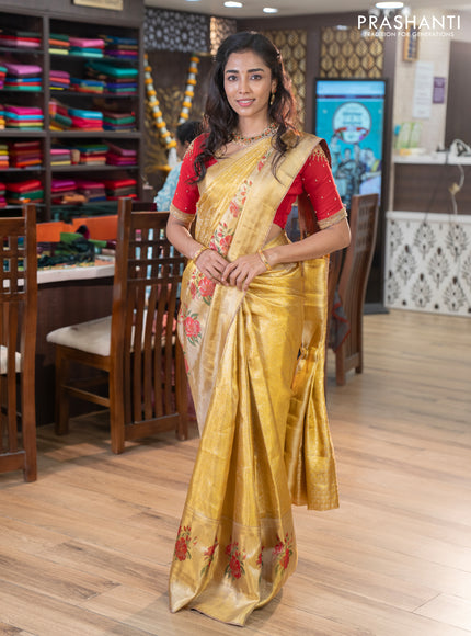 Pure kanchipuram tissue silk saree gold and red with allover zari weaves and floral design butta border