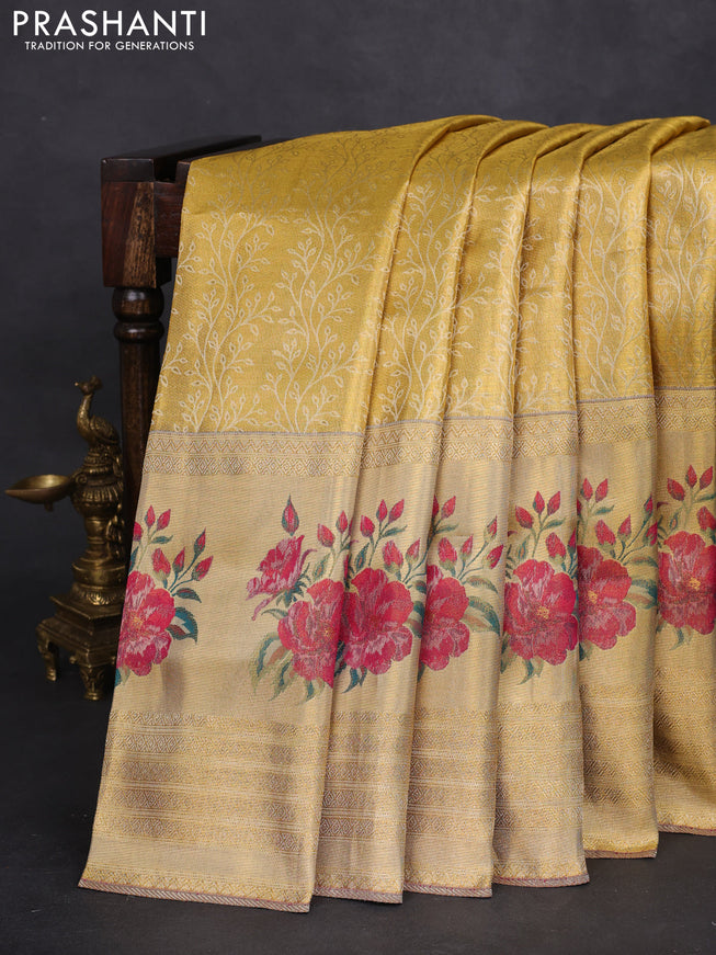 Pure kanchipuram tissue silk saree gold and pink with allover zari weaves and floral design butta border