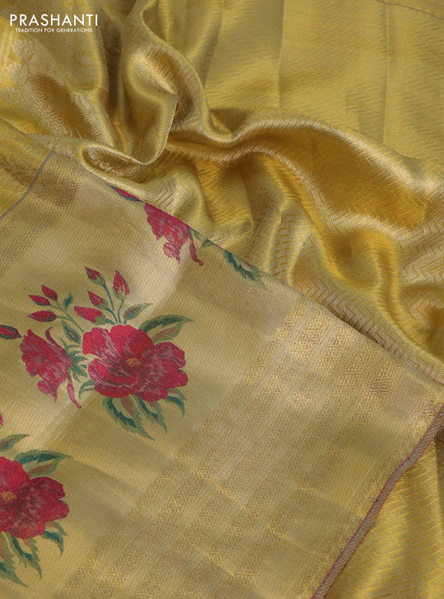 Pure kanchipuram tissue silk saree gold and pink with allover zari weaves and floral design butta border