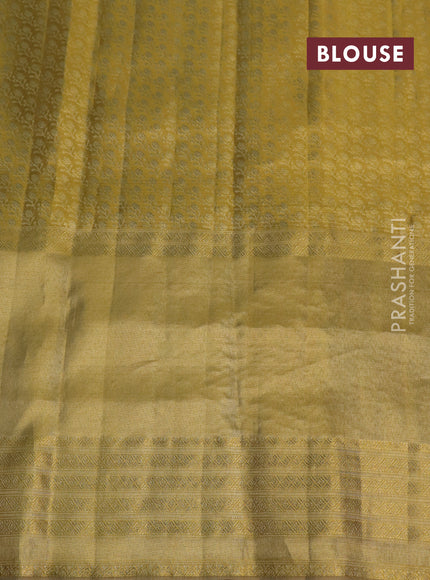 Pure kanchipuram tissue silk saree gold and pink with allover zari weaves and floral design butta border