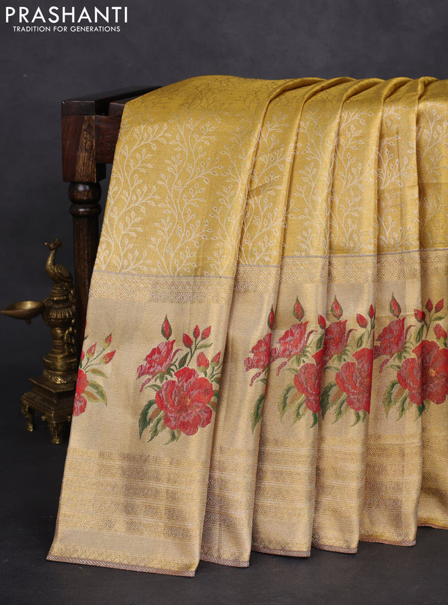Pure kanchipuram tissue silk saree gold and maroon with allover zari weaves and floral design butta border