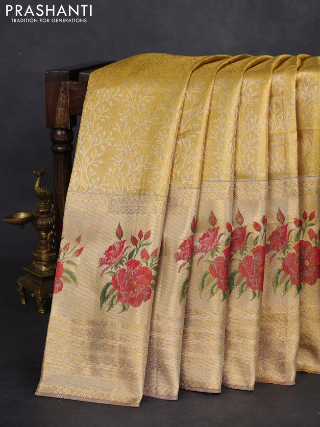 Pure kanchipuram tissue silk saree gold and maroon with allover zari weaves and floral design butta border