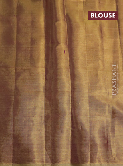 Pure kanchipuram tissue silk saree gold and dual shade of purple with floral design motif and long rich floral design border