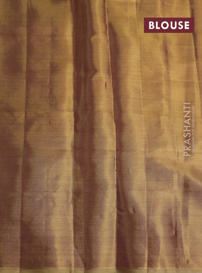 Pure kanchipuram tissue silk saree gold and dual shade of purple with floral design motif and long rich floral design border