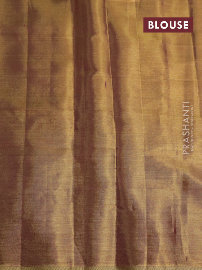 Pure kanchipuram tissue silk saree gold and dual shade of purple with floral design motif and long rich floral design border