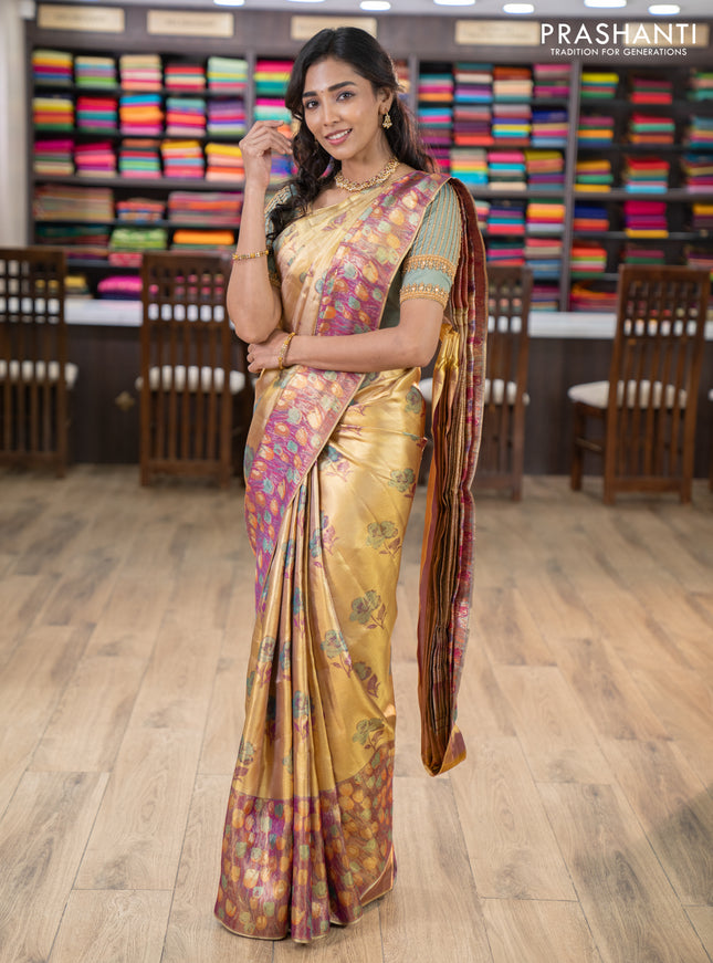 Pure kanchipuram tissue silk saree gold and dual shade of purple with floral design motif and long rich floral design border