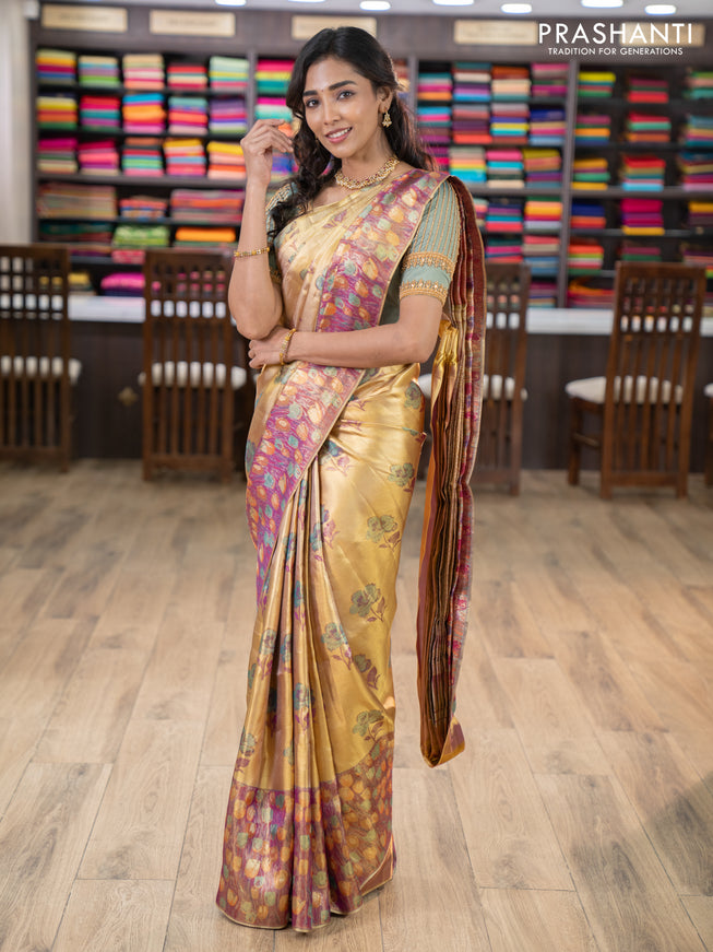 Pure kanchipuram tissue silk saree gold and dual shade of purple with floral design motif and long rich floral design border