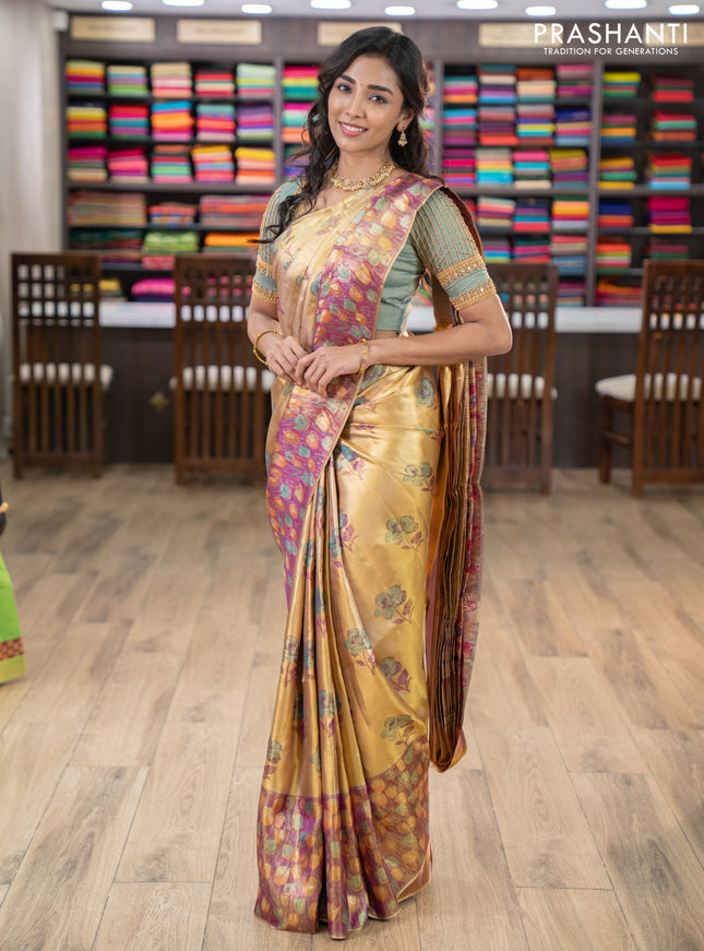 Pure kanchipuram tissue silk saree gold and dual shade of purple with floral design motif and long rich floral design border