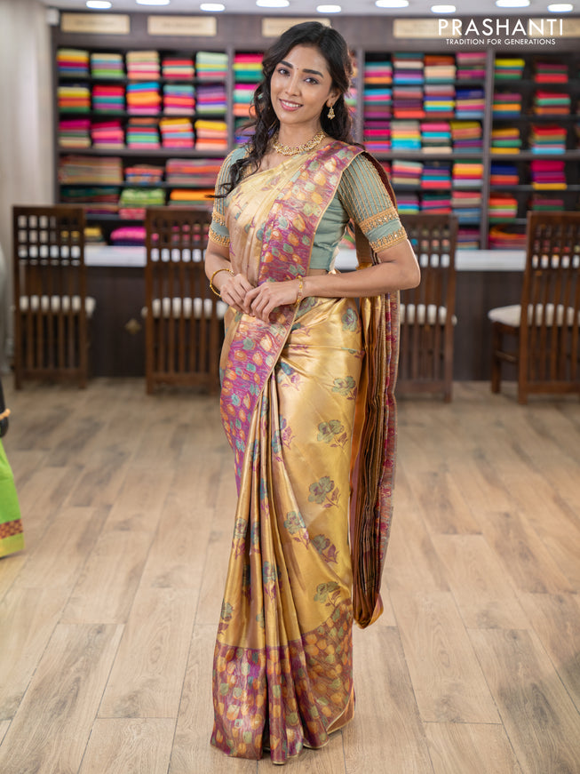 Pure kanchipuram tissue silk saree gold and dual shade of purple with floral design motif and long rich floral design border