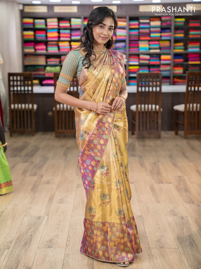 Pure kanchipuram tissue silk saree gold and dual shade of purple with floral design motif and long rich floral design border