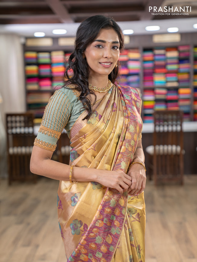 Pure kanchipuram tissue silk saree gold and dual shade of purple with floral design motif and long rich floral design border