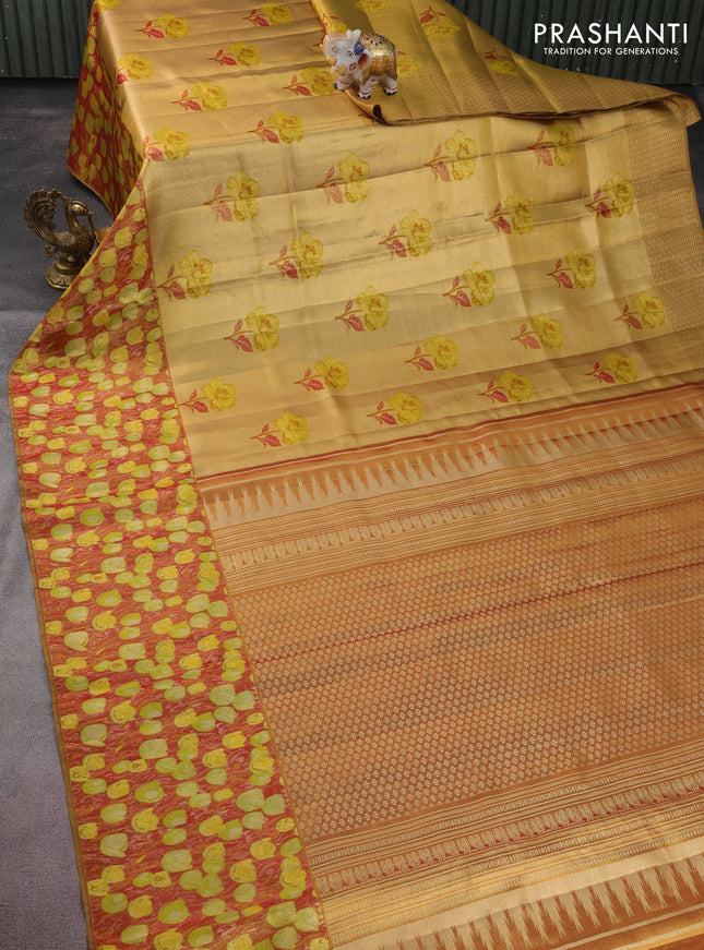 Pure kanchipuram tissue silk saree gold and maroon with floral design motif and long rich floral design border