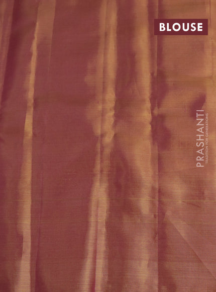 Pure kanchipuram tissue silk saree dual shade of pastel pink with allover rich pichwai design weaving and zari woven border