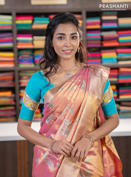 Pure kanchipuram tissue silk saree dual shade of pastel pink with allover rich pichwai design weaving and zari woven border