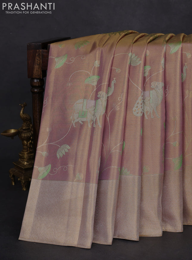 Pure kanchipuram tissue silk saree dual shade of pastel lavender with allover rich pichwai design weaving and zari woven border