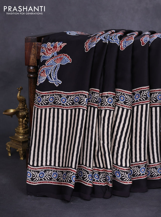 Modal silk saree black with ajrakh butta prints and printed border