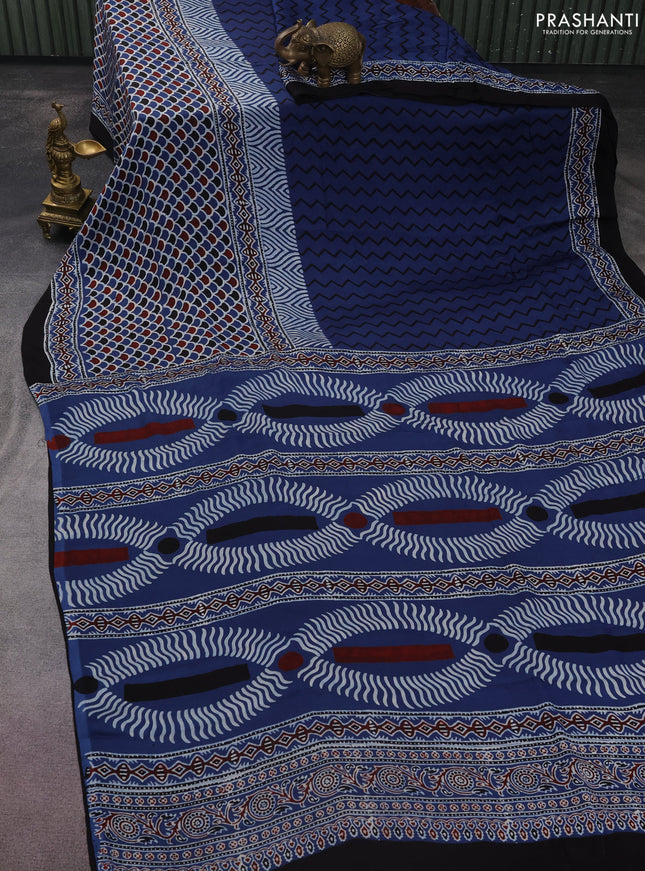 Modal silk saree blue and black with allover ajrakh prints and printed border