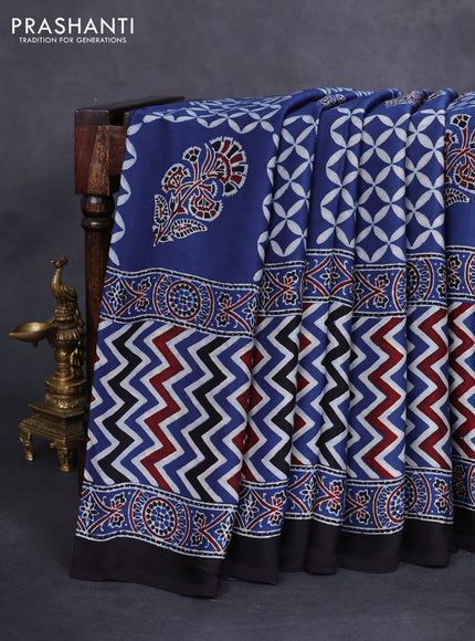 Modal silk saree blue and black with allover ajrakh prints and printed border