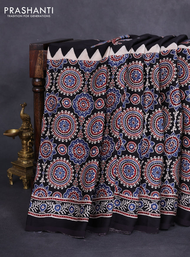 Modal silk saree black with ajrakh butta prints and printed border