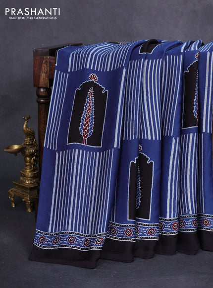 Modal silk saree blue and black with allover ajrakh prints and printed border